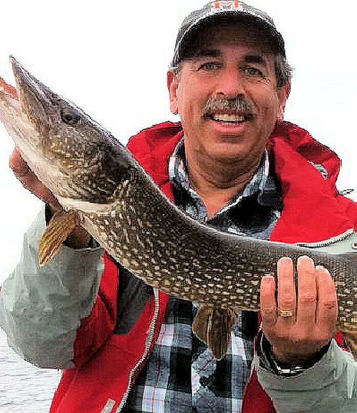 Garden Island angler shows the large toothy mouth of a trophy Ontario northern pike.