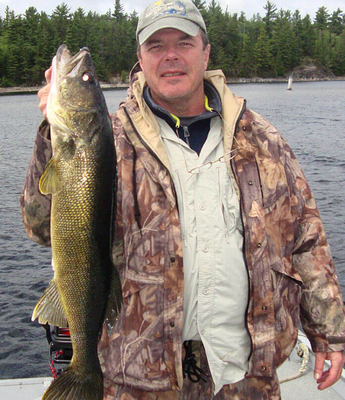 American Plan angler with large Ontario walleye.